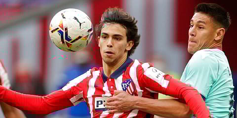 Atletico Madrid's Joao Felix is challenged by Levante's Oscar Duarte (Photo | AP)