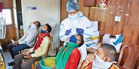 RT-PCR tests being conducted at a centre in Thane district of Maharashtra. (Photo | PTI)