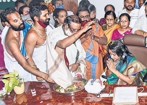 TRS corporator from Banjara Hilla division Gadwal Vijayalakshmi prays before taking charge as the Mayor at the GHMC head office on Monday | Vinay madapu