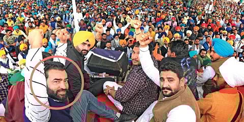 Lakha Sidhana (circled), wanted in connection with the January 26 violence, at a rally in Bathinda on Tuesday. (Photo | PTI)