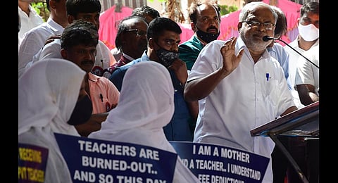 Education Minister Suresh Kumar addresses protesters | Express
