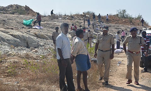 Police personnel inspect the quarry site where gelatin sticks exploded, killing six people, at at Hirenagavalli village, in Chikkaballapur district. (Photo | Express)