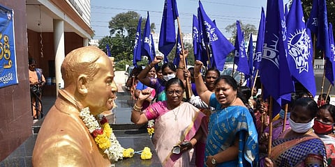 Dalit Sthree Sakthi organiser Geddam Jhansi and other women raising slogans during the 15th annual conference at Ambedkar Bhavan in Vijayawada. (Photo | P Ravindra Babu, EPS)
