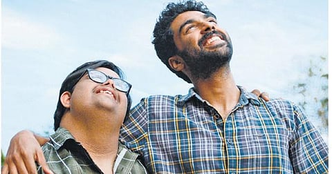 Thoma, and his Down syndrome-affected older brother, Sebu/Ismu, played by George Kora and Gopi Krishna Varma.