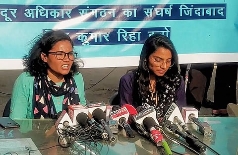 Nodeep Kaur the 23-year-old labour rights activist who was released on bail Friday addresses a press conference at Singhu border. (Photo | PTI)