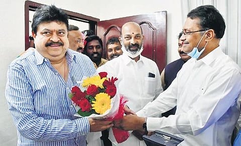 K Dileep Kumar joins BJP in the presence of BJP State president Bandi Sanjay Kumar and BJP MLC Graduate candidate N Ramchander Rao in Hyderabad on Friday