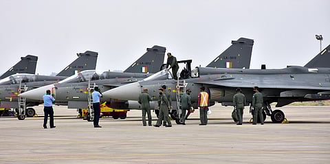 The Chief of the Air Staff Air Chief Marshal RKS Bhadauria getting down after flying the LCA Tejas MK-1 aircraft. (File photo| EPS)