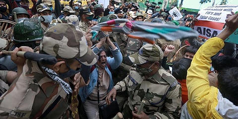 Woman folds her hands in front of security at a protest showing solidarity with farmers protesting against farm laws in New Delhi. (Photo| Shekhar Yadav, EPS)