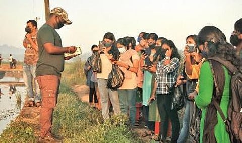 Students of All Saints’ College attend awareness class on the conservation of wetlands at Vellayani | Express