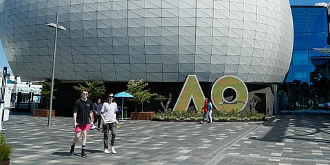Spectators walk around Melbourne Park, venue for the Australian Open tennis championships in Melbourne. (Photo | AP)