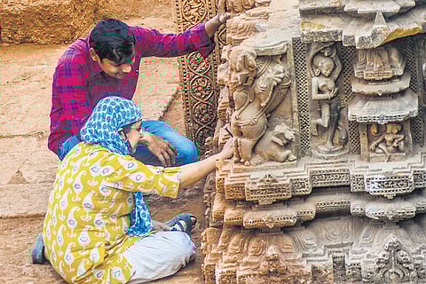 ASI archaeologists cleaning the Sari temple in Bhubaneswar. (Photo | Express)