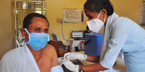 A health worker giving Covishield vaccine for ENT Hospital in Visakhapatnam. (Photo | G Satyanarayana, EPS)