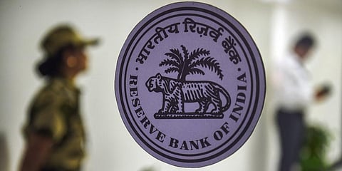 A security woman guards at the RBI headquarters