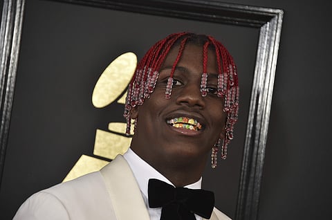 Hip Hop artist Lil Yachty in his rainbow grills for the Grammys 2017. (Photo | AP)