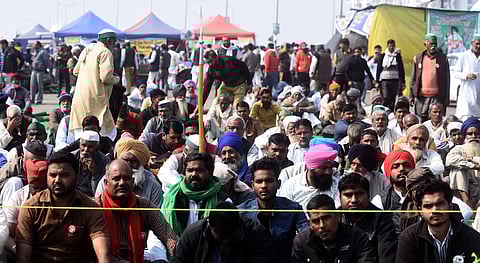 Farmers during their ongoing protest against Centres farm laws at Ghazipur border in New Delhi on Sunday Feb. 7 2021. (Photo | Parveen Negi/EPS)