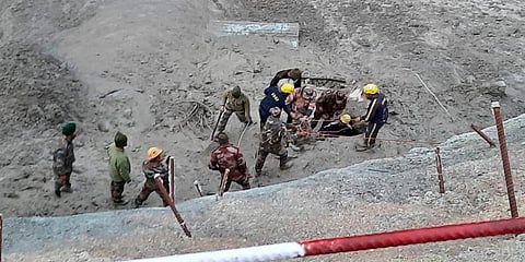 Officials carry out search and rescue operation at Tapovan Tunnel after a glacier broke off in Joshimath in Uttarakhand's Chamoli causing a massive flood in the Dhauli Ganga river. (Photo | PTI)