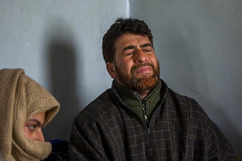 Mushtaq Ahmad Wani, father of 16-year-old Athar Mushtaq, who was fatally shot by Government forces. (Photo| AP)