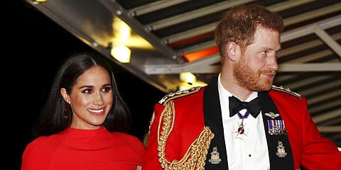 Prince Harry (R) and wife Meghan Markle (File photo| AP)