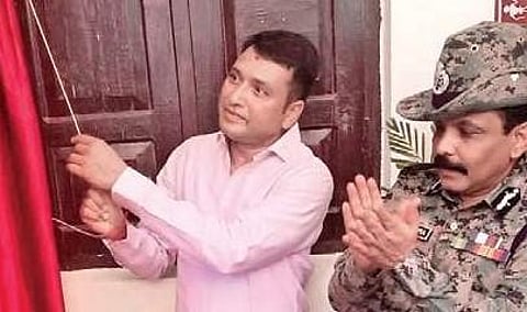 Minister Dibya Shankar Mishra (L)