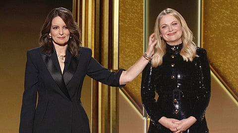 In this video grab issued Sunday, by NBC, hosts Tina Fey, left, from New York, and Amy Poehler, from Beverly Hills, speak at the Golden Globe Awards. (Photo | AP)