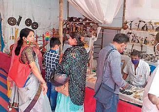 The exhibition provides an opportunity for artisans to interact with customers.