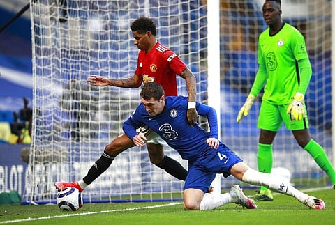 Manchester United's Marcus Rashford, left, and Chelsea's Andreas Chistensen challenge for the ball during the English Premier League (Photo | AP)