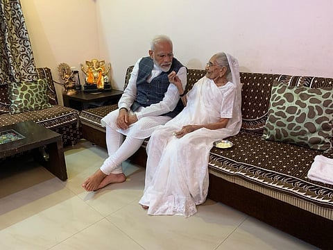 PM Modi with his mother Heeraban Modi (Photo | ANI)