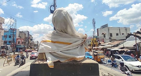The Gandhi bust that was covered by election officials in Madurai. (Photo | K K Sundar, EPS)