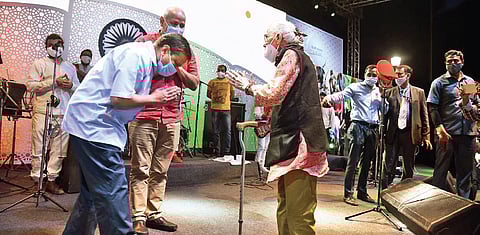 CM Arvind Kejriwal with a senior citizen during Freedom@75 event | Parveen Negi