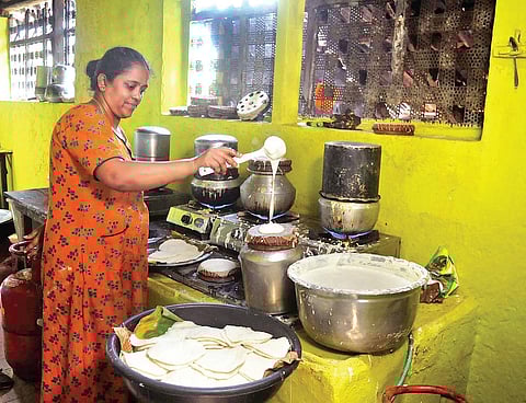 the toddy capital of Kerala; Smitha prepares idli at her kitchen in the famed Ramassery Idly shop in Palakkad | A Sanesh
