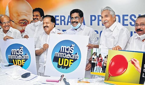 KPCC president Mullapally Ramachandran, Opposition Leader Ramesh Chennithala and former chief minister Oommen Chandy release the campaign slogan, 'UDF for a better Kerala' in Thiruvananthapuram.