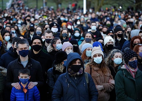 People gather, at the band stand in Clapham Common, in memory of Sarah Everard, after an official vigil was cancelled, in London. (Photo | AP)