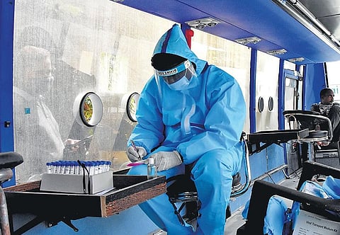 Health workers collect samples for Covid-19. (File Photo | Madhav K, EPS)