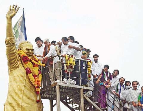 YSRC MP Vijayasai Reddy garlanding the statue of former chief minister the late YS Rajasekhara Reddy at the Beach Road in Visakhapatnam on Sunday I Express
