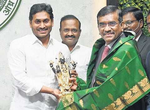 CM Jagan Mohan Reddy felicitates Union Bank of India MD and CEO Rajkiran Rai G at the launch of the temple management system at Tadepalli on Monday | Express