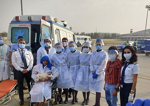 Cabin crew with the baby and mother (Photo | Special arrangement)