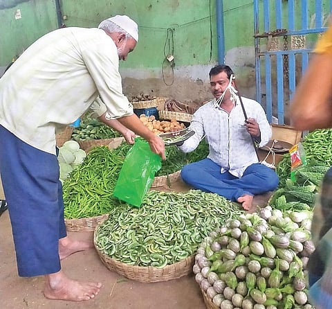 File photo of Shaik Fayaz Basha selling vegetables at Rayachoti I Express