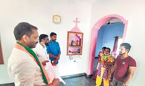 BJP president K Surendran meeting Congress worker Flavia Monteiro at her house at Permude in Paivalike panchayat in Kasaragod.