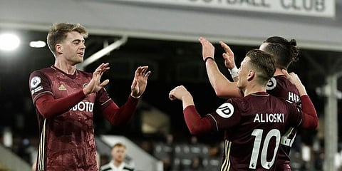 Leeds United's Patrick Bamford celebrates after scoring his side's opening goal against Fulham at Craven Cottage stadium, London, Friday, March 19, 2021. (Photo | PTI)