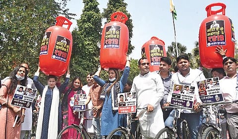 Indian Youth Congress workers take part in cycle march to protest against the fuel price hike in New Delhi on Friday | Parveen Negi