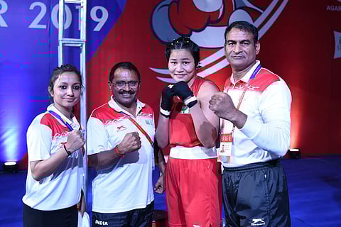 Chanu (in red) with youth team coaches (Photo | Express)