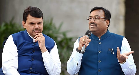 Former Maharashtra CM Devendra Fadnavis along with BJP leader Sudhir Mungantiwar. (File photo | PTI)