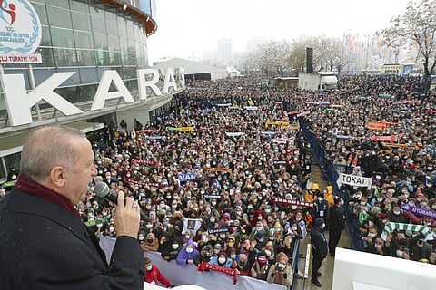 Turkey's President Recep Tayyip Erdogan delivers a speech to gathered supporters outside a packed sports hall where he also attended his ruling party's congress in Ankara (Photo | AP)