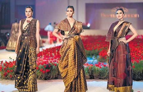 Weaving her silk purse