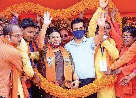 BJP MP Gautam Gambhir (R) at an election rally in West Midnapore on Thursday | pti