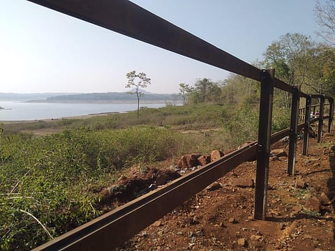 Rail barricade constructed over 4.5 km between Nagavara and Purabairavanahalli to prevent elephants straying into human habitats (Photo | Express)