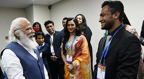 Prime Minister Narendra Modi with Bangladeshi cricketer Shakib Al Hasan (R). (Photo | Twitter/@PMOIndia)
