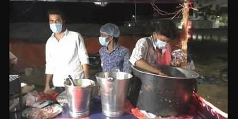 The engineers with their food trolley.