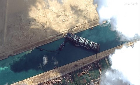 This satellite image from Maxar Technologies shows the cargo ship MV Ever Given stuck in the Suez Canal near Suez, Egypt, March 26. (Photo | AP)