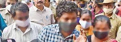 Family members of the woman, seen in the CD, address the media outside the SIT office, in Bengaluru on Saturday | Ashishkrishna H P